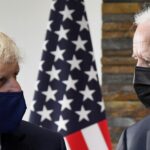 The Latest: Biden presents UK’s Johnson with a US-made bike