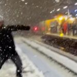 Commuters Pass Time With Snowball Fights At London Station As Trains Are Delayed