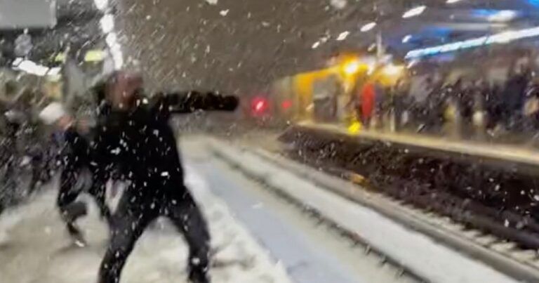 Commuters Pass Time With Snowball Fights At London Station As Trains Are Delayed